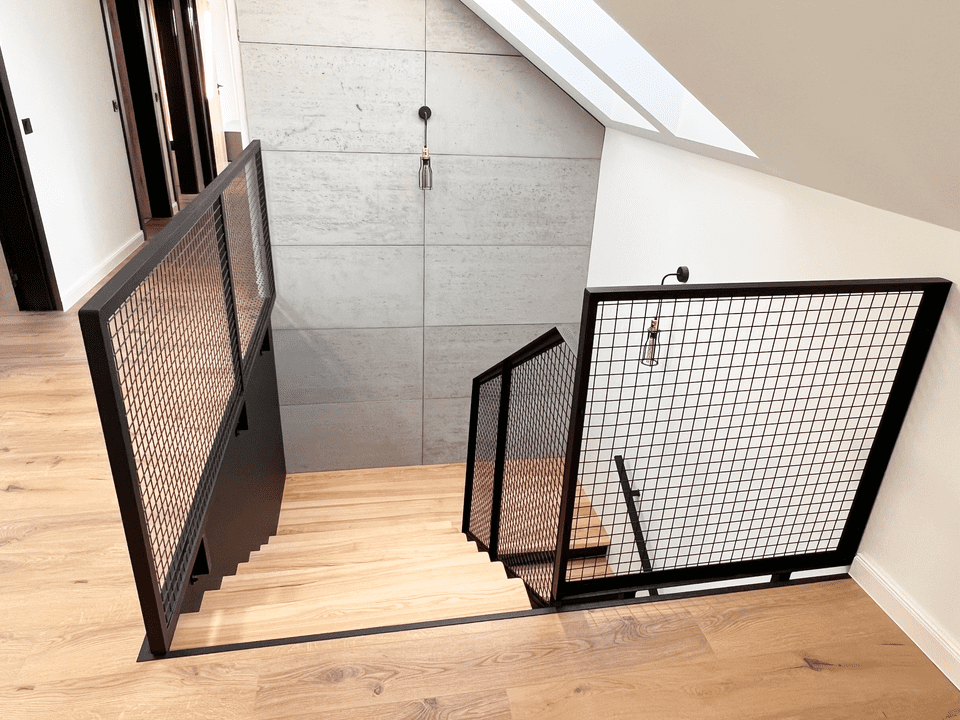 Modern lattice balustrade made of steel mesh.