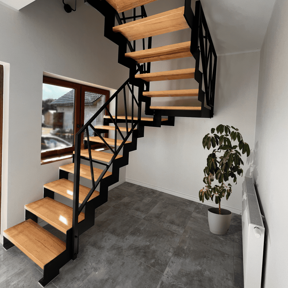 Self-supporting zigzag staircase of steel construction with ashlar.