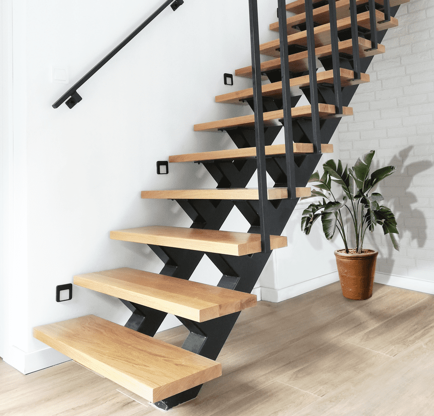 Metal staircase on two supporting profiles arranged symmetrically with oak steps.