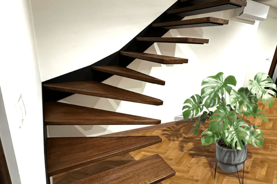 Hanging stairs on a steel tub - levitating oak steps.