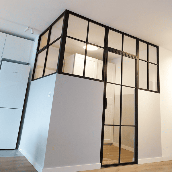 Loft wall with outward opening door